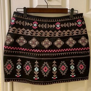 NWOT. Tribal print skirt with metallic gold thread and sequins.